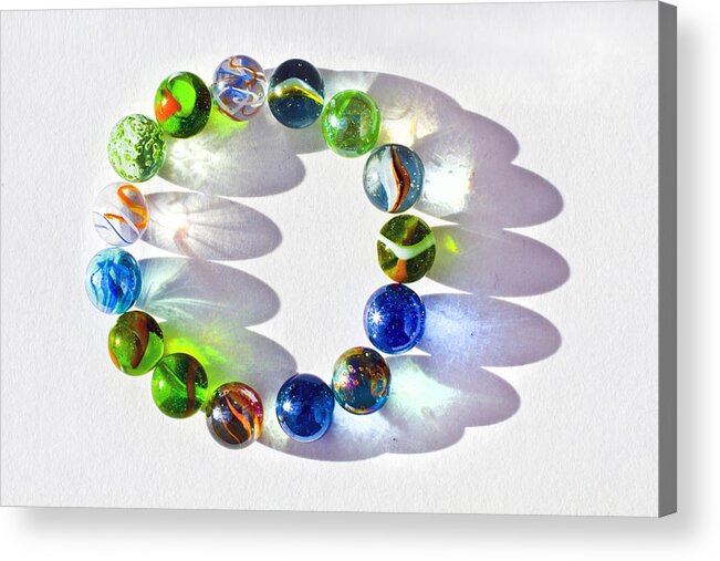 White Background Acrylic Print featuring the photograph Circle of marbles by Catherine MacBride