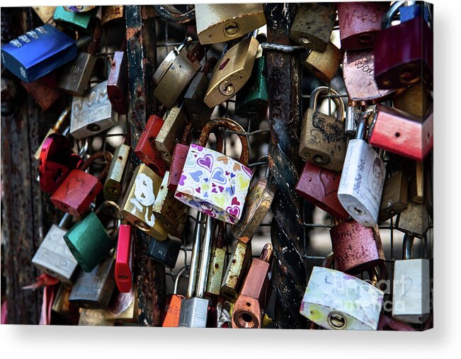 Attached Acrylic Print featuring the photograph Colorful Love Padlocks Attached On Iron Fence by Andreas Berthold
