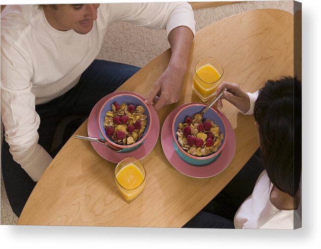 Breakfast Acrylic Print featuring the photograph Couple having breakfast by Comstock Images