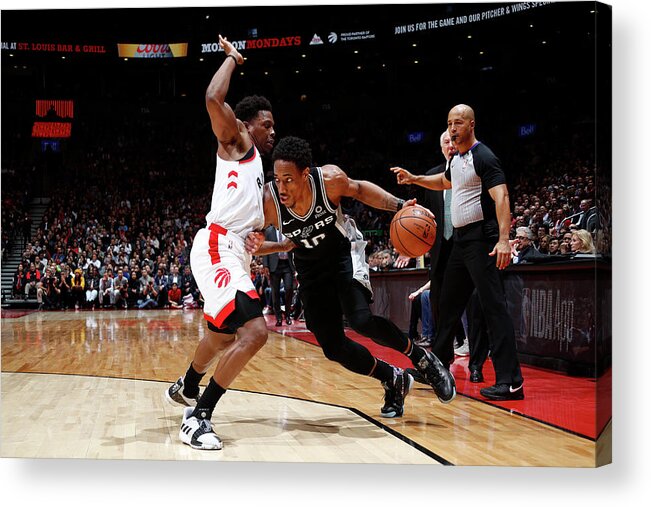 Demar Derozan Acrylic Print featuring the photograph Demar Derozan and Kyle Lowry by Mark Blinch