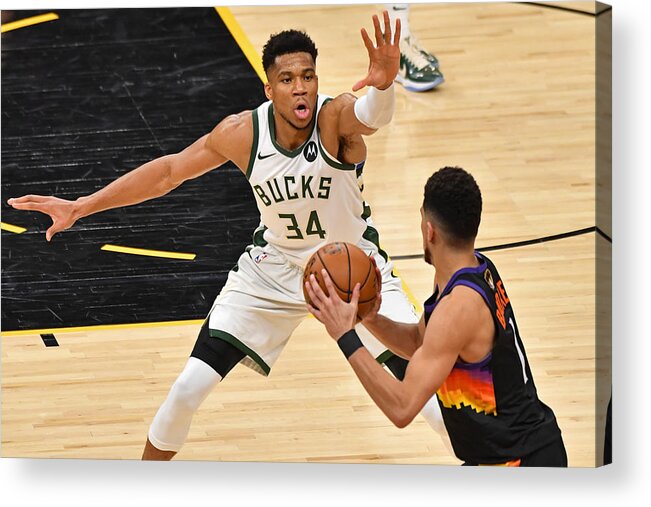 Giannis Antetokounmpo Acrylic Print featuring the photograph Devin Booker and Giannis Antetokounmpo by Jesse D. Garrabrant