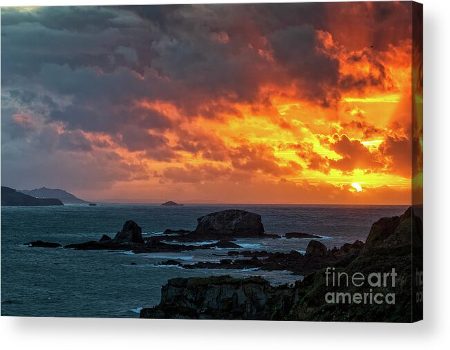 Stone Acrylic Print featuring the photograph Dramatic Sky of Fire over Miranda Islands at the Mouth of Ares Estuary La Coruna Galicia by Pablo Avanzini