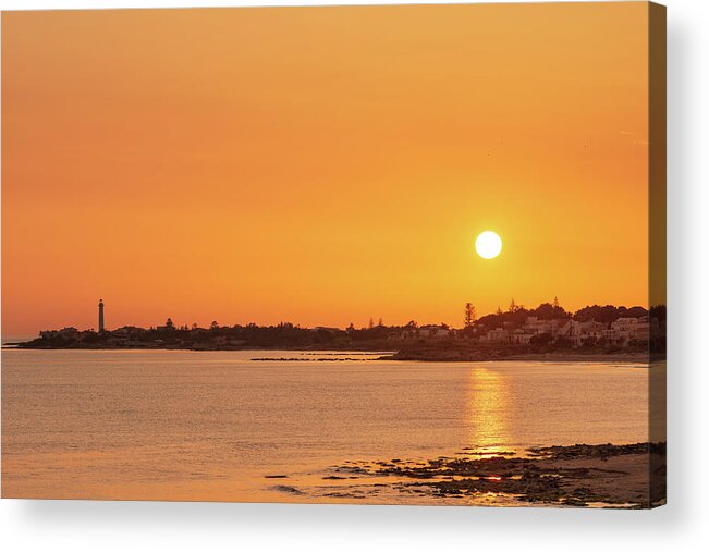 Sicily Acrylic Print featuring the photograph Enjoying an orange warm sunset over the sea in Sicily by Mirko Chessari