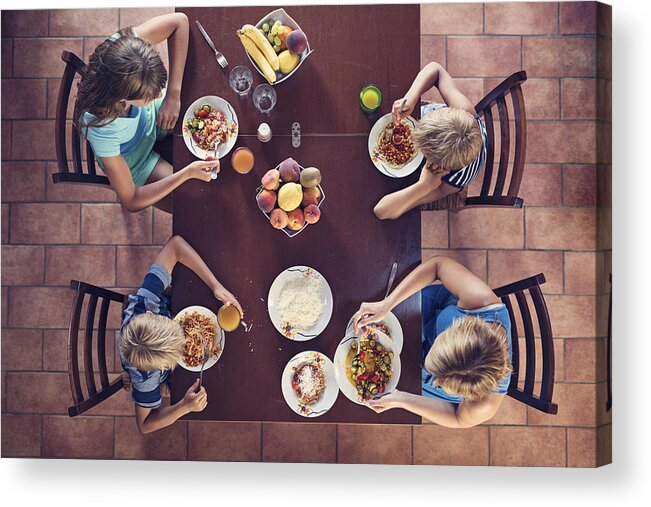Sister Acrylic Print featuring the photograph Family enjoying spaghetti lunch by Imgorthand