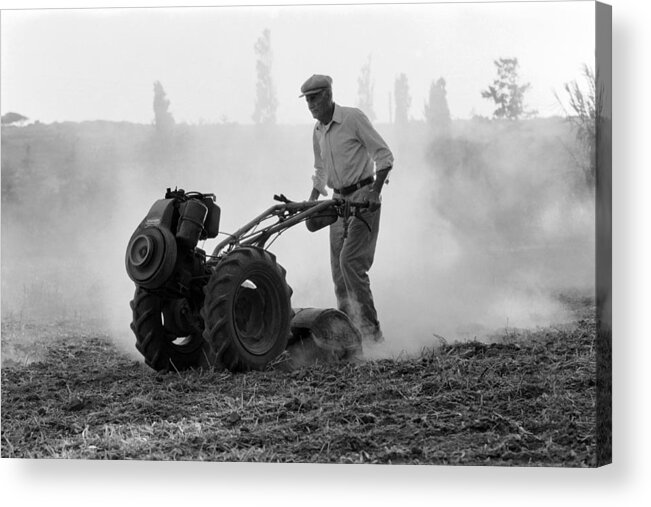 Farmers Acrylic Print featuring the photograph Farmer plows the land by Dubi Roman