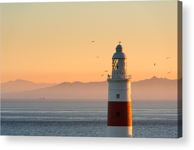 Scenics Acrylic Print featuring the photograph Gibraltar Lighthouse at sunset by © Allard Schager