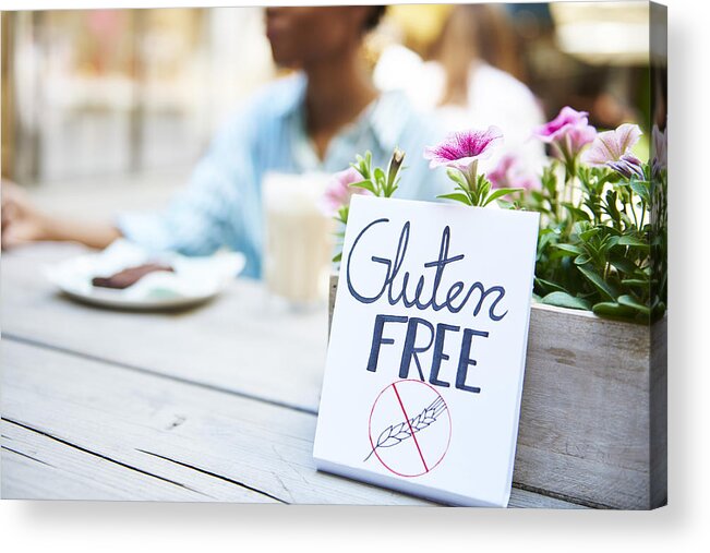 Outdoors Acrylic Print featuring the photograph 'Gluten free' sign at pavement cafe by Westend61