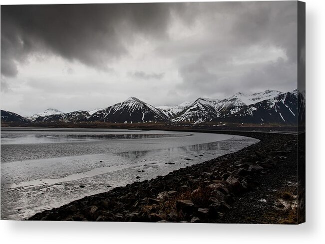 Iceland Acrylic Print featuring the photograph Icelandic landscape with frozen lake and mountains covered in snow by Michalakis Ppalis