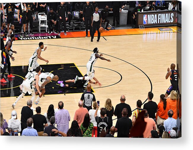 Jrue Holiday Acrylic Print featuring the photograph Jrue Holiday and Devin Booker by Jesse D. Garrabrant