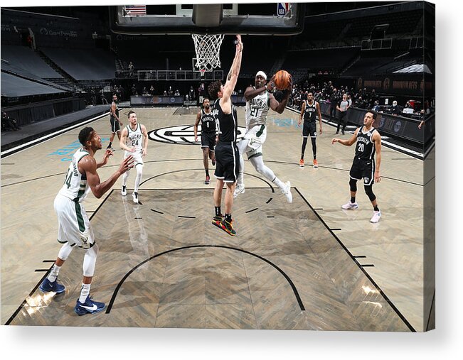 Jrue Holiday Acrylic Print featuring the photograph Jrue Holiday by Nathaniel S. Butler