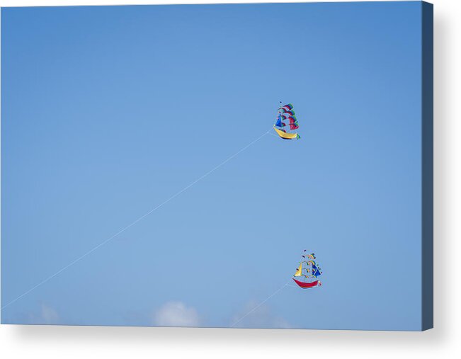 Tranquility Acrylic Print featuring the photograph Kites in the clear sky of Bali by Mauro Tandoi