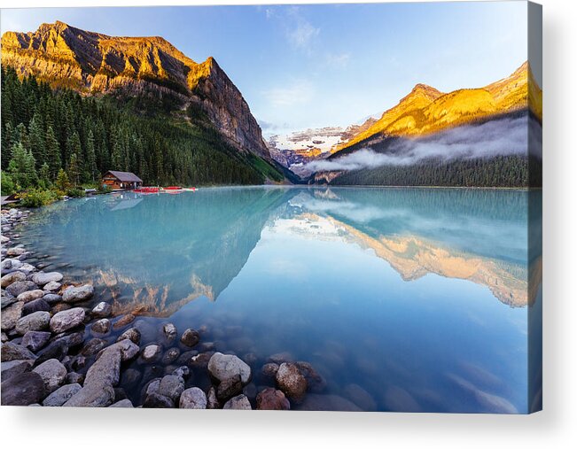 Scenics Acrylic Print featuring the photograph Lake Louise at sunrise, calm water and light on the mountain tops. Banff, Alberta, Canada. by Francesco Riccardo Iacomino