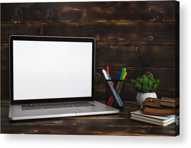 Working Acrylic Print featuring the photograph Laptop with Blank White Screen Against Rustic Wood Background. Screen Mock Up. by Constantine Johnny
