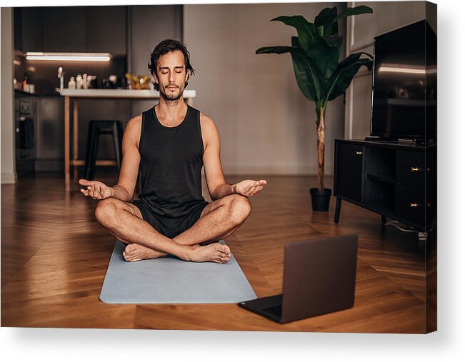 Computer Acrylic Print featuring the photograph Man meditating in the living room by Hirurg