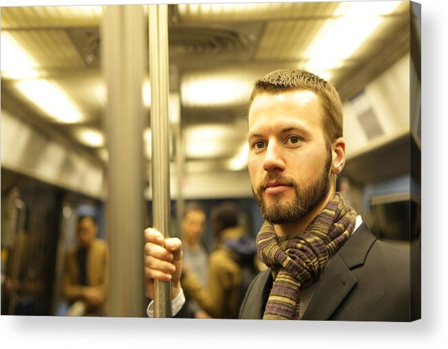 Pole Acrylic Print featuring the photograph Man stood on underground train by Peter Cade