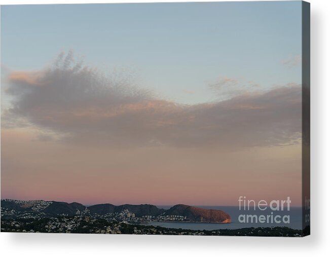 Mediterranean Coast Acrylic Print featuring the photograph Pale pink sky and soft clouds at sunset on the Mediterranean coast by Adriana Mueller