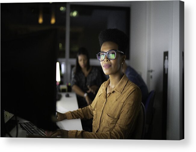 New Business Acrylic Print featuring the photograph Portrait of businesswoman working late in the office by FG Trade