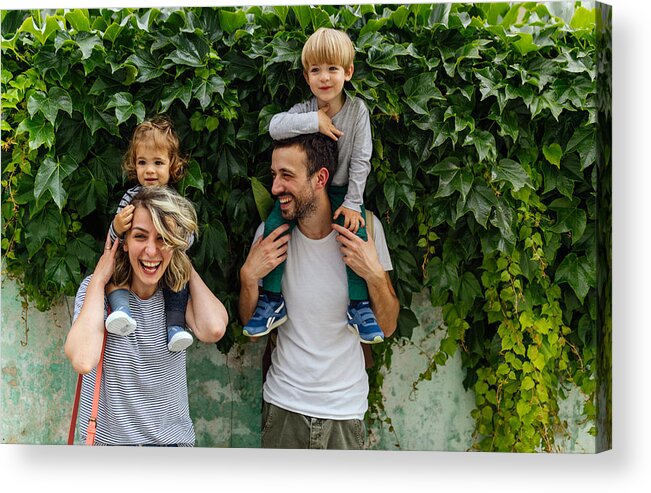 Cool Attitude Acrylic Print featuring the photograph Portrait of happy family outdoors by AleksandarNakic