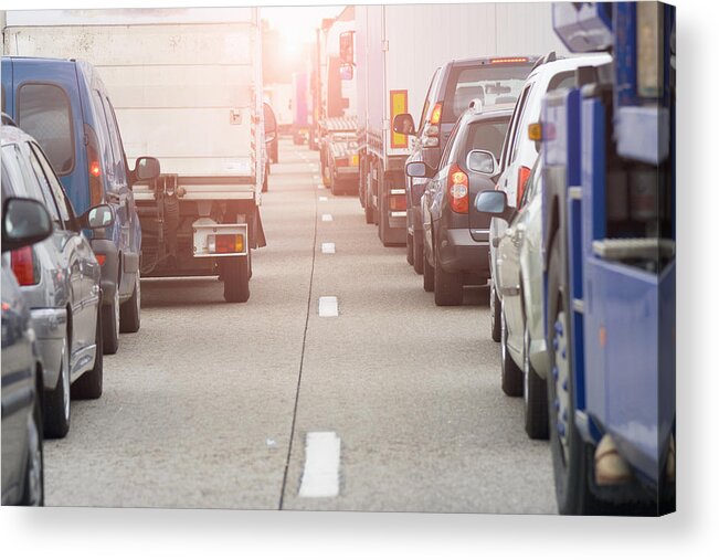Outdoors Acrylic Print featuring the photograph Rear view of rows of traffic queueing on highway by Walter Zerla