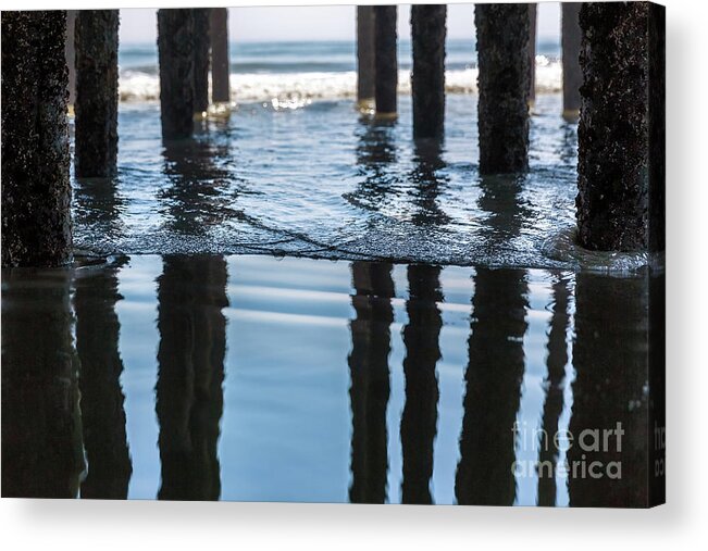 Old Orchard Beach Acrylic Print featuring the photograph Selective focus on a gentle wave under the pier at Old Orchard B by Jane Rix