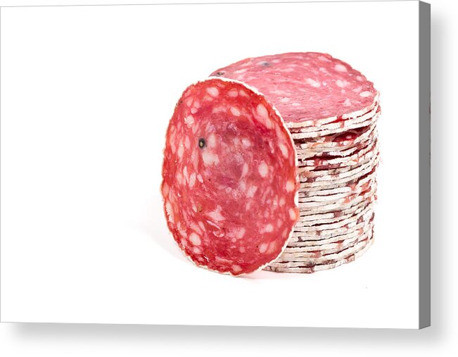 White Background Acrylic Print featuring the photograph Slices of salami sausages isolated on a white background by R.Tsubin