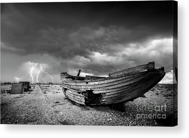 Stormy Sky Acrylic Print featuring the photograph Stormy Dungeness, Wrecked boat on a shingle beach with lightning by Neale And Judith Clark