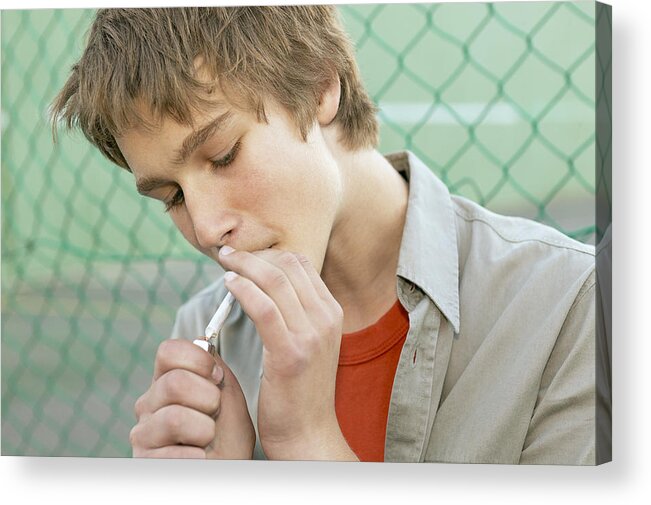 Smoking Acrylic Print featuring the photograph Teen boy smoking by Tomas Rodriguez