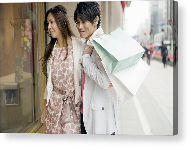 30-34 Years Acrylic Print featuring the photograph The man and woman is window-shopping by Michael H