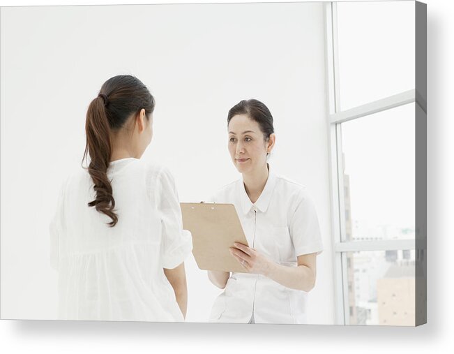 Expertise Acrylic Print featuring the photograph The middle-aged nurse who asks a woman by Indeed