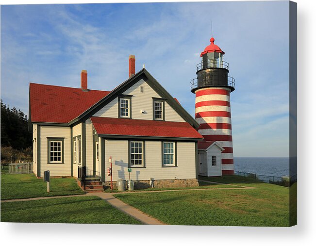 Tranquility Acrylic Print featuring the photograph The red-and-white striped West Quoddy Head Lighthouse in Maine by Rainer Grosskopf