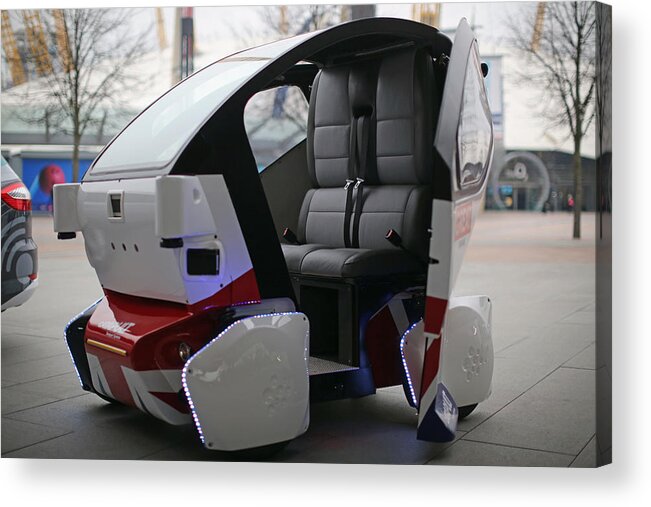 England Acrylic Print featuring the photograph The UK's First Driverless Pods Are Unveiled At The O2 Arena by Dan Kitwood
