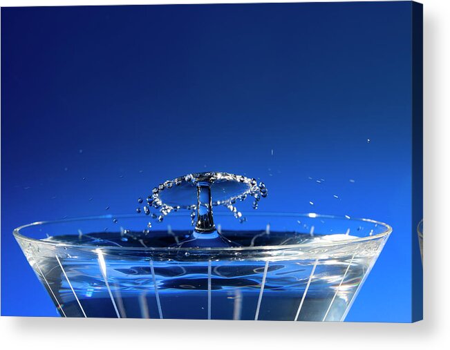 North Wilkesboro Acrylic Print featuring the photograph Water Drops Collide Over Martini Glass Blue by Charles Floyd