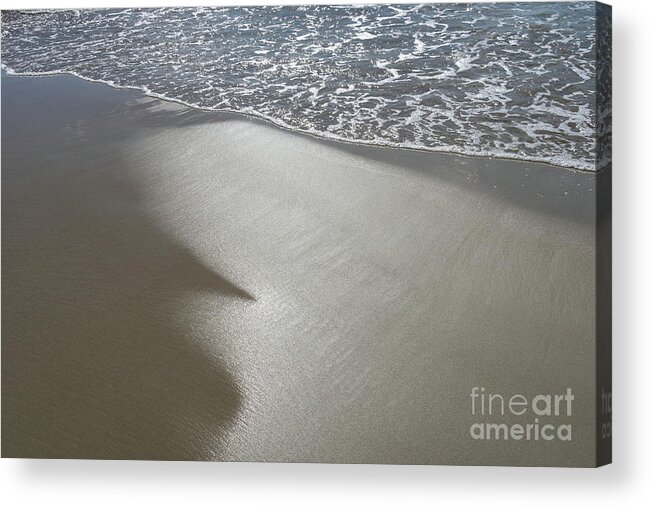 Sandy Beach Acrylic Print featuring the photograph Wet sand, sea water and reflections of sunlight by Adriana Mueller