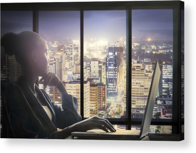 People Acrylic Print featuring the photograph Woman at computer watching city by Buena Vista Images
