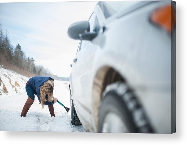 Problems Acrylic Print featuring the photograph Woman digging car out from snow by Hugh Whitaker