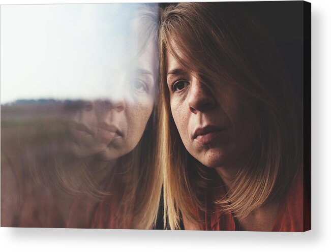 Problems Acrylic Print featuring the photograph Woman in train alone and sad by Marjan_Apostolovic