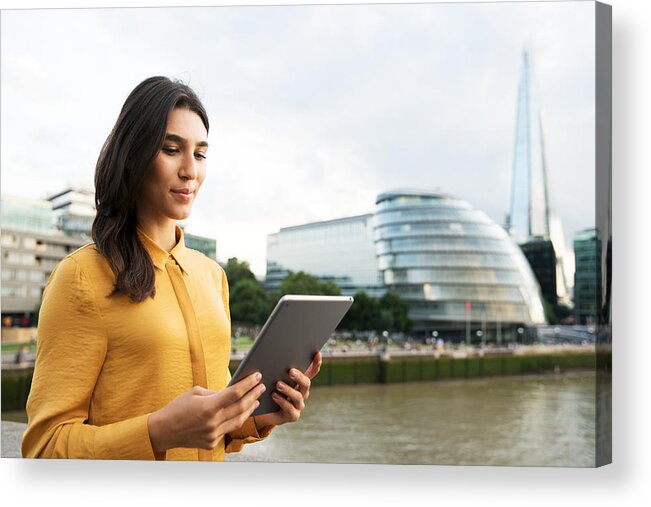 Gla Building Acrylic Print featuring the photograph Woman with tablet by Tim Robberts
