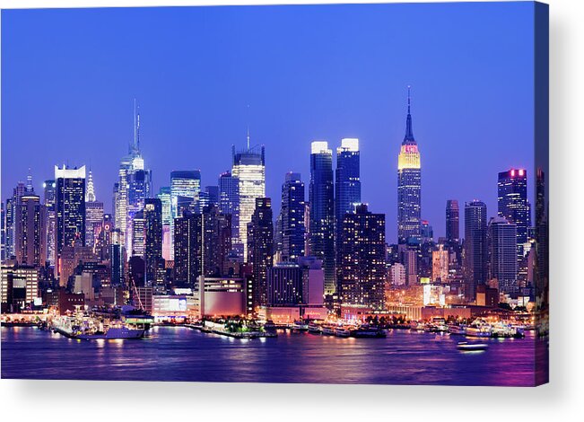 Water's Edge Acrylic Print featuring the photograph Midtown Manhattan City Skyline At Night by Deejpilot