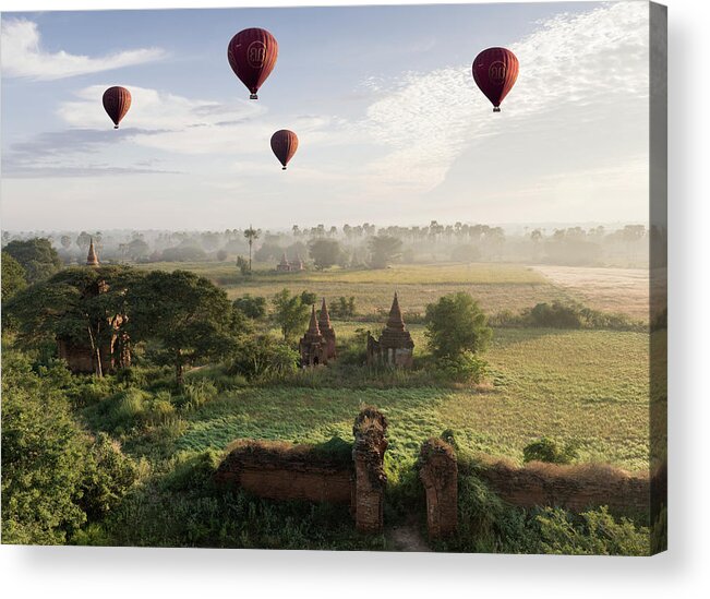 Hot Air Balloon Acrylic Print featuring the photograph Hot Air Balloons Flying Over Ancient by Martin Puddy