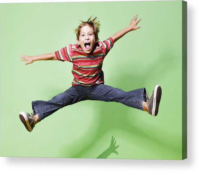 Human Arm Acrylic Print featuring the photograph Young boy jumping in mid-air by Robert Daly