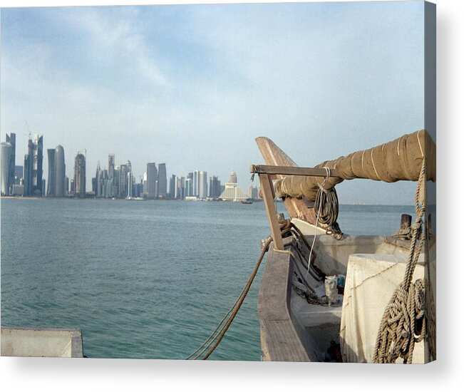 Dhow Acrylic Print featuring the photograph Moored dhow and Doha by Paul Cowan