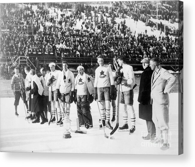 The Olympic Games Acrylic Print featuring the photograph Canadian Hockey Team With Olympic Cup by Bettmann