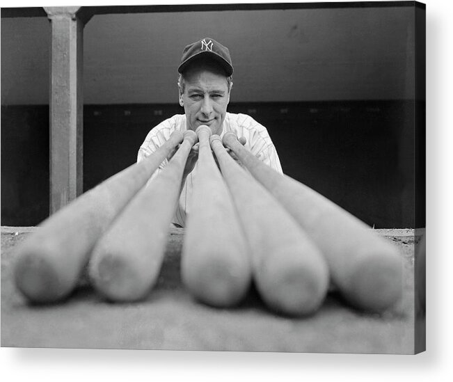 People Acrylic Print featuring the photograph Lou Gehrig Examining Baseball Bats by Bettmann