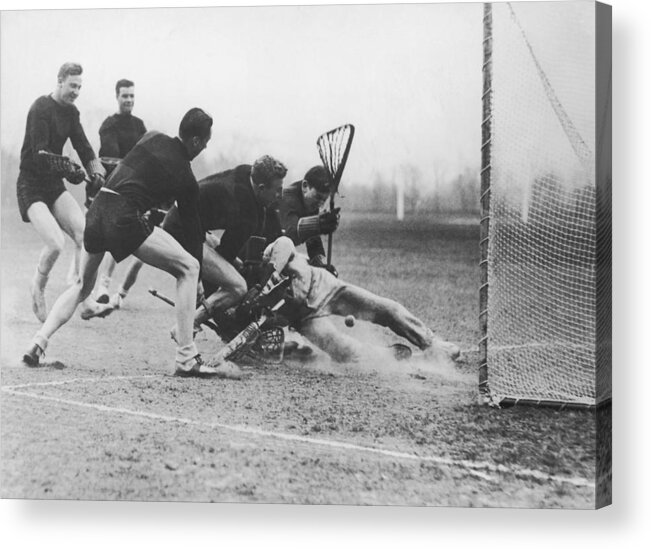 Young Men Acrylic Print featuring the photograph Men Playing Lacrosse B&w by Fpg