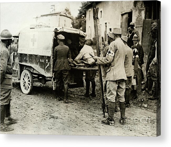 Ambulance Acrylic Print featuring the photograph Red Cross Moving Wounded Soldiers by Bettmann