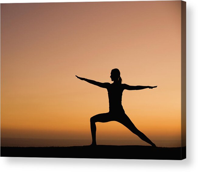 Tranquility Acrylic Print featuring the photograph Silhouette Of Woman Doing Yoga by Erik Isakson