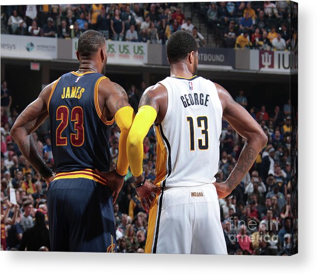 Playoffs Acrylic Print featuring the photograph Paul George and Lebron James by Ron Hoskins