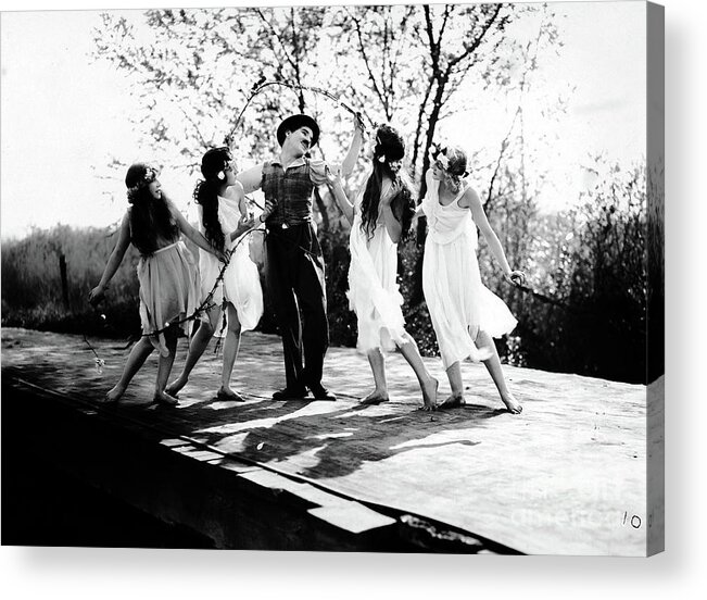 Dancing Acrylic Print featuring the photograph Charlie Chaplin Frolicking with Dancing Nymphs by Sad Hill - Bizarre Los Angeles Archive