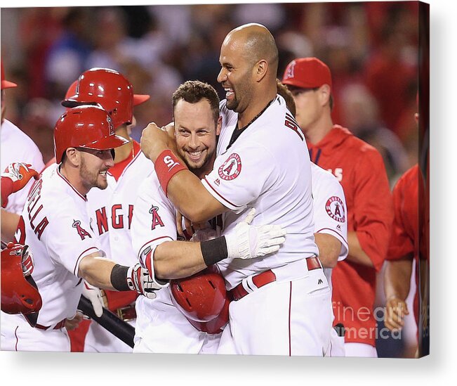 Ninth Inning Acrylic Print featuring the photograph Johnny Giavotella, Albert Pujols, and Daniel Nava by Stephen Dunn