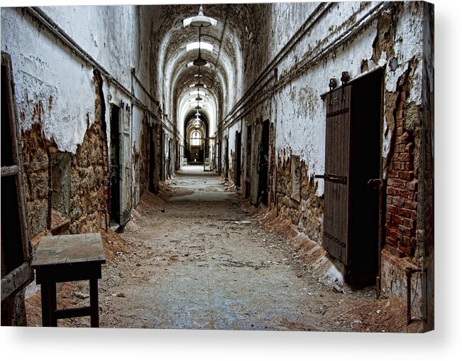 Eastern State Penitentiary Acrylic Print featuring the photograph Abandoned Cell Block 3 by Michael Dorn